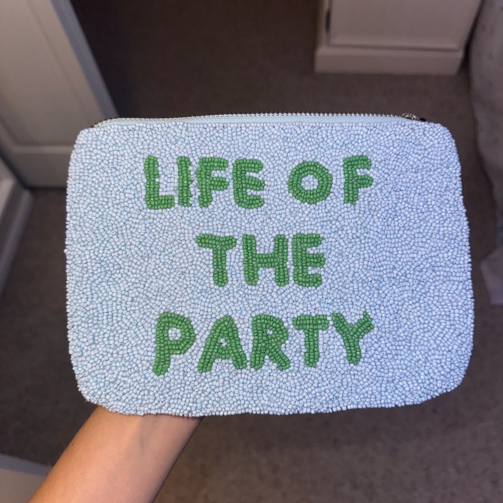 Kate spade light blue Beaded Clutch with Green Text